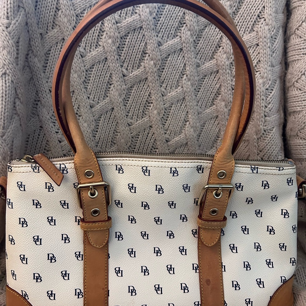 Vintage Dooney and Bourke very well loved and used.  See photos.